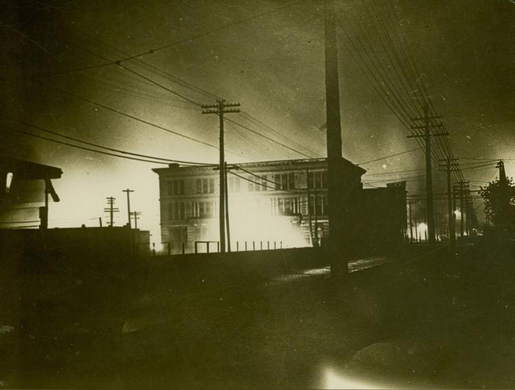 Fire burns on the night of the riot in East St. Louis near the city library, at Eighth Street and Broadway. (Missouri History Museum)
